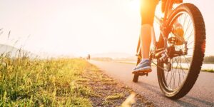 bicyclist riding on the road